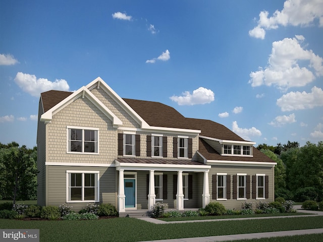view of front facade featuring a front yard and covered porch