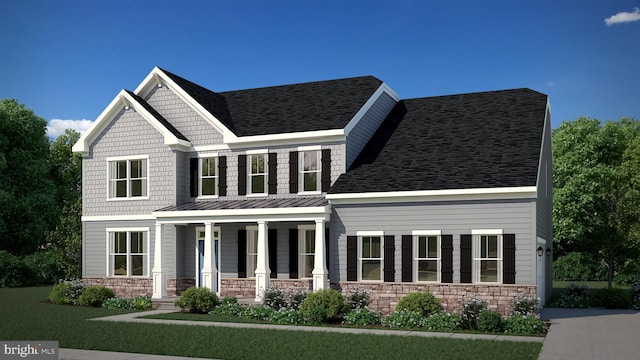 view of front of property with covered porch and a front lawn