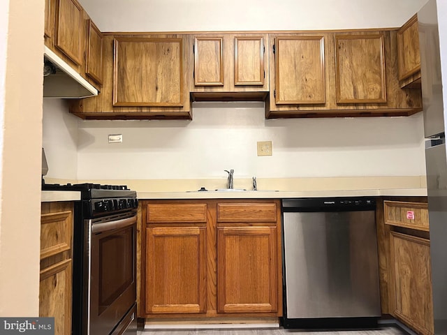 kitchen featuring stainless steel appliances and sink