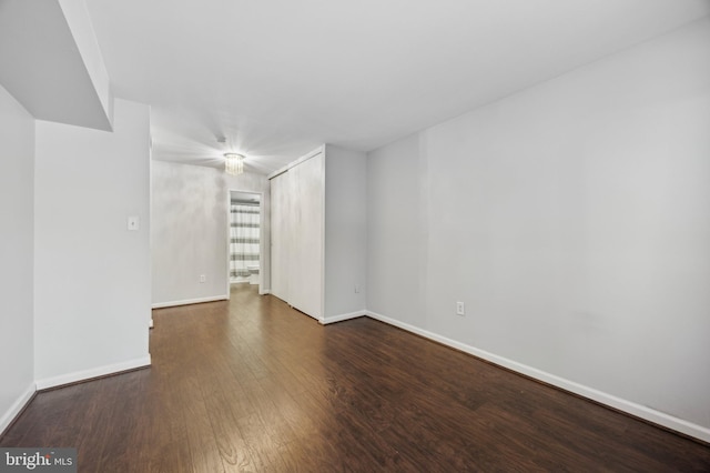 empty room featuring dark hardwood / wood-style floors