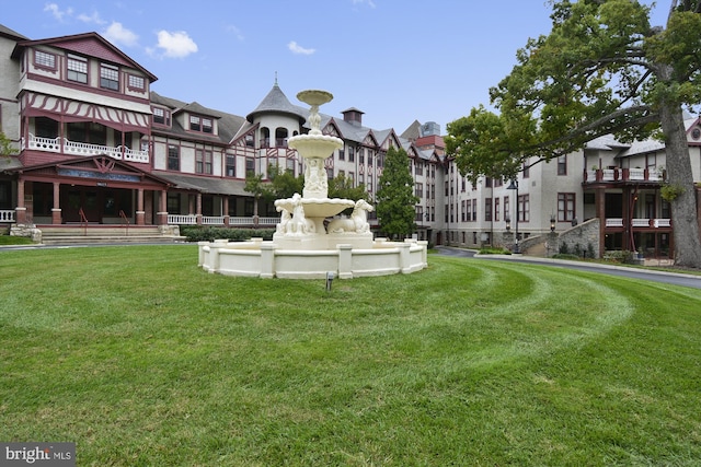 view of community with a lawn