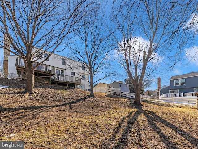 view of yard with a deck