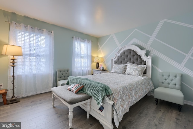 bedroom with wood-type flooring