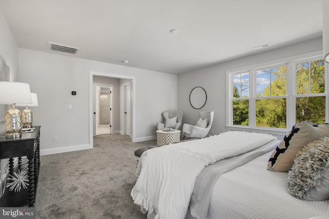 bedroom featuring carpet, visible vents, and baseboards