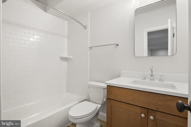 bathroom with shower / bathing tub combination, vanity, and toilet