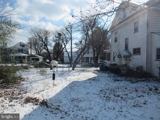 view of yard covered in snow