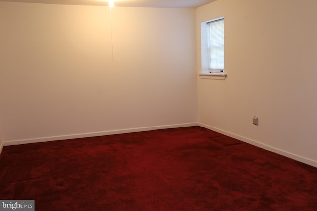 empty room with carpet flooring