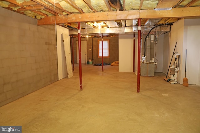 basement featuring heating unit