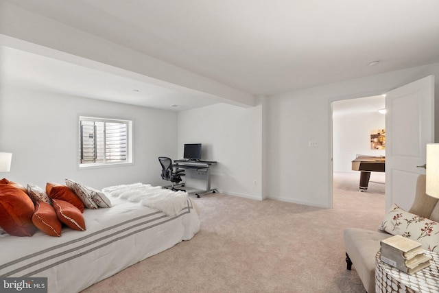 bedroom with light colored carpet