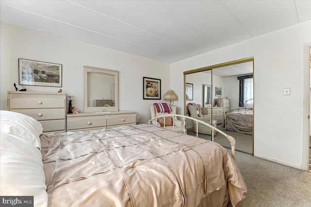 carpeted bedroom featuring a closet