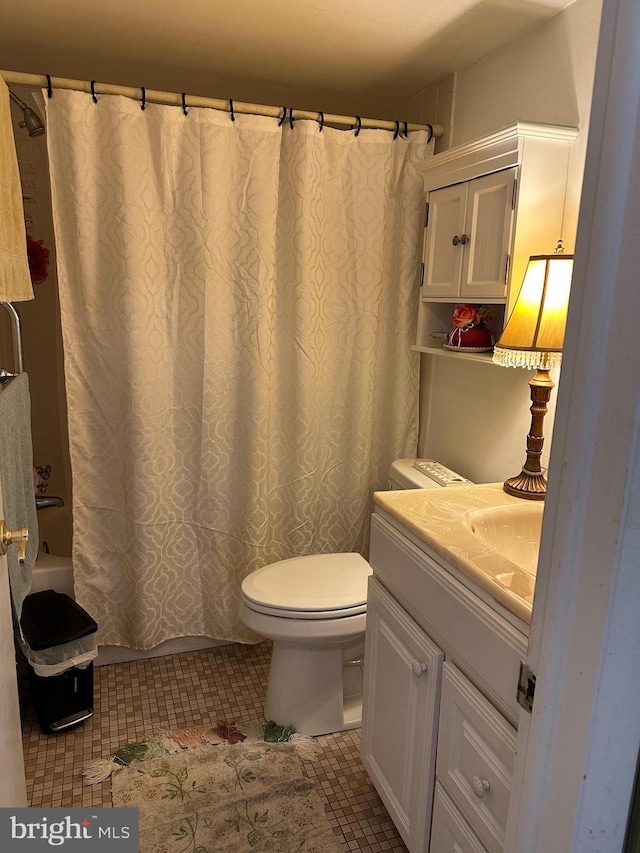 full bathroom with vanity, tile patterned floors, toilet, and shower / bathtub combination with curtain