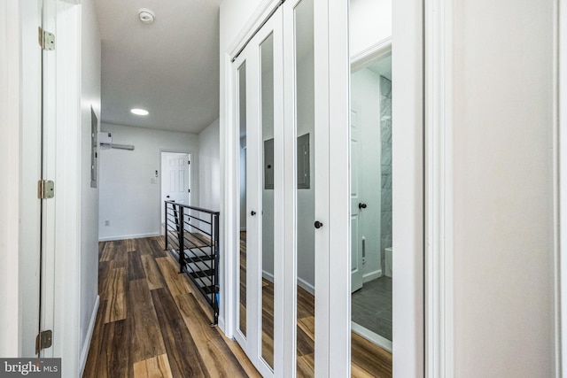 hallway featuring dark wood-type flooring