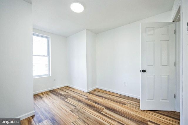 unfurnished room featuring light hardwood / wood-style flooring