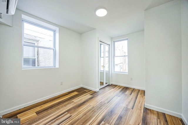 empty room featuring hardwood / wood-style floors