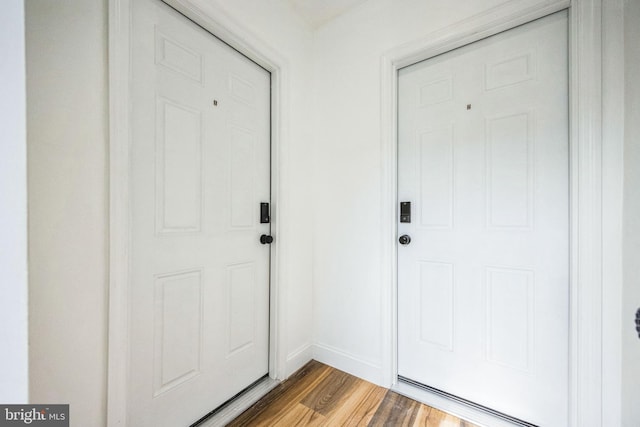 doorway to outside featuring hardwood / wood-style flooring