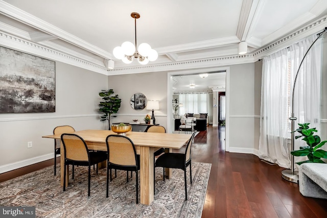 dining space with crown molding, baseboards, dark wood finished floors, and a notable chandelier