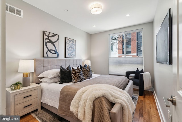 bedroom featuring light hardwood / wood-style floors