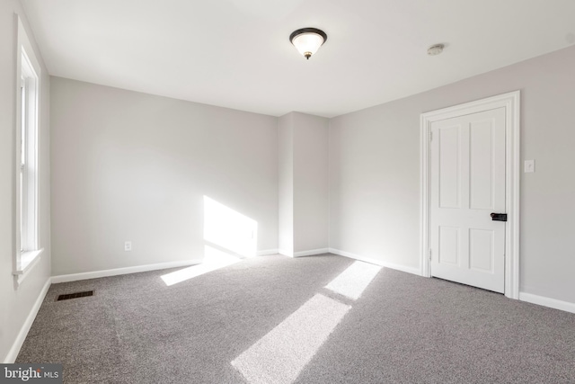 view of carpeted spare room