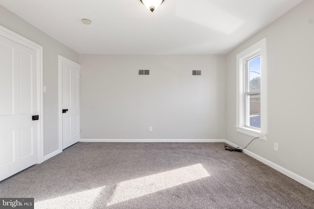 view of carpeted spare room