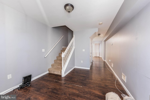 interior space with dark hardwood / wood-style floors