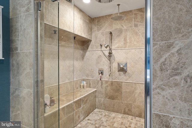 bathroom featuring a stall shower