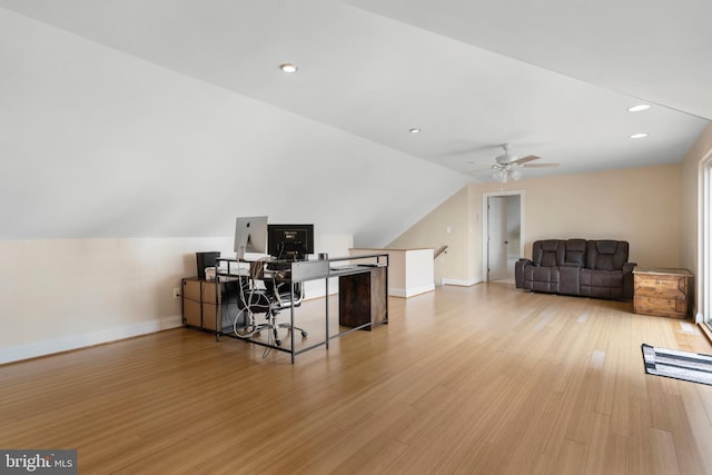 office area with recessed lighting, a ceiling fan, vaulted ceiling, light wood-type flooring, and baseboards