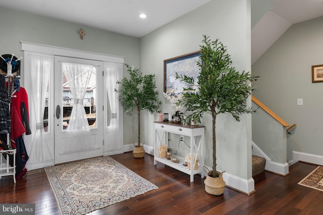 entrance foyer featuring stairway, dark wood-style flooring, recessed lighting, and baseboards