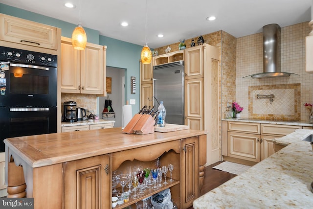 kitchen featuring a kitchen island, hanging light fixtures, light brown cabinetry, wall chimney exhaust hood, and black appliances