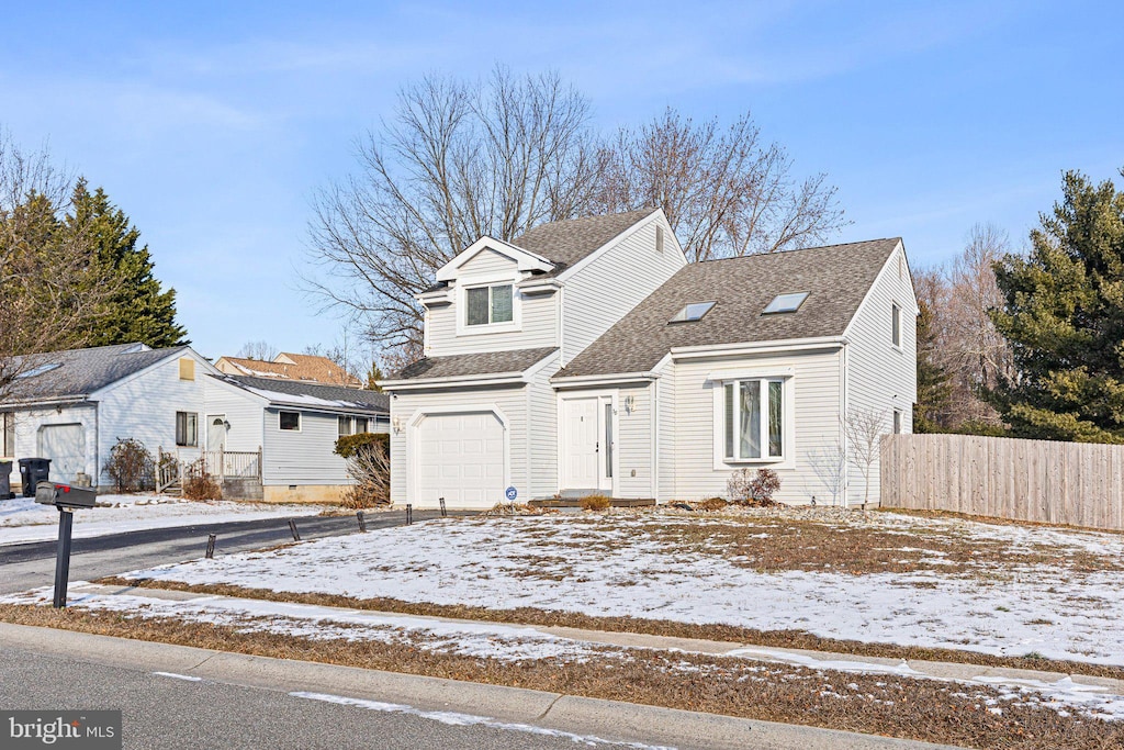 view of front property with a garage