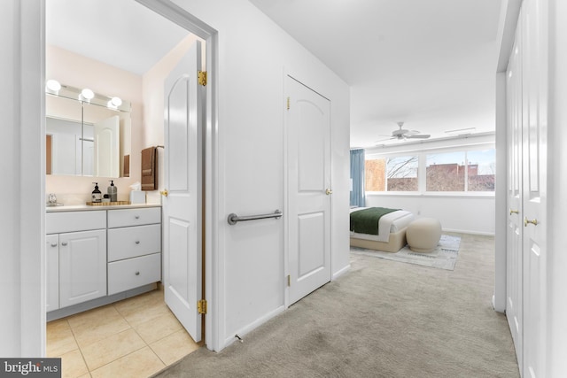 bathroom with vanity, tile patterned floors, and ceiling fan