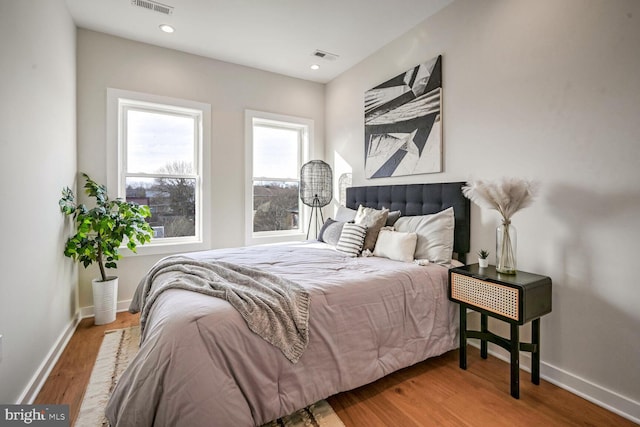 bedroom featuring hardwood / wood-style flooring