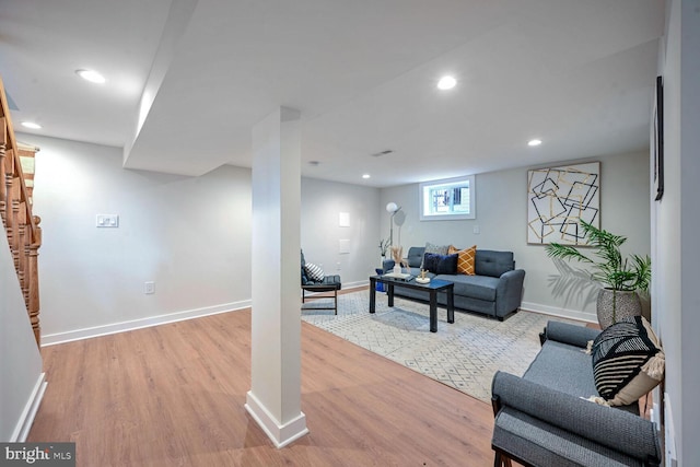 living room with light hardwood / wood-style floors