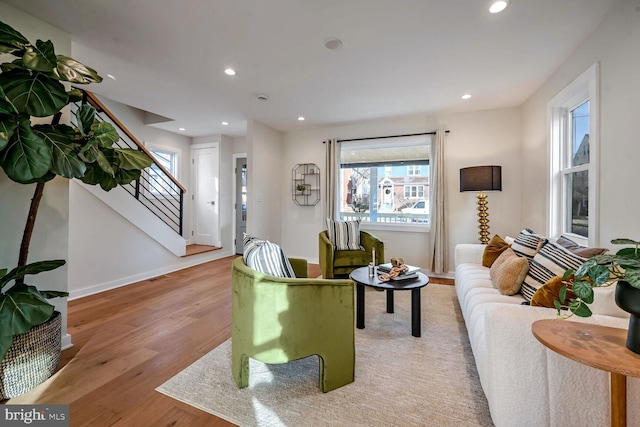 living room with light hardwood / wood-style floors