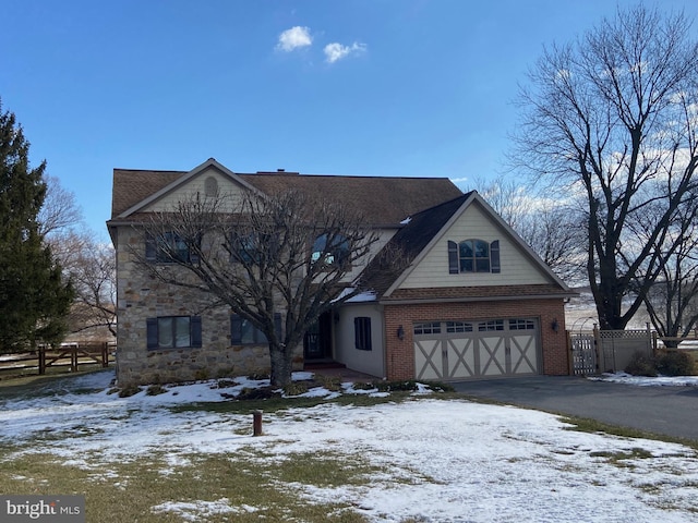 view of front of property featuring a garage