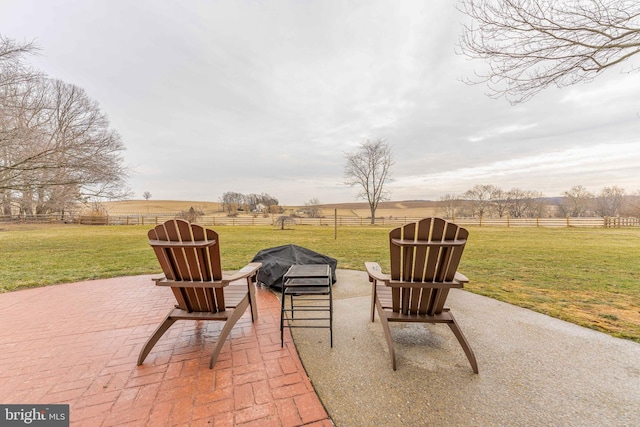 view of patio with a rural view