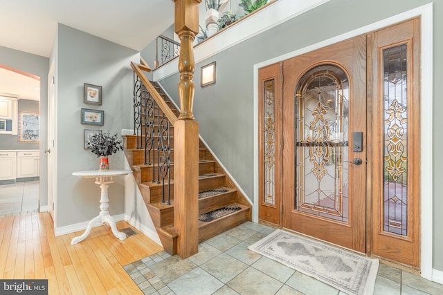 foyer entrance featuring light hardwood / wood-style floors