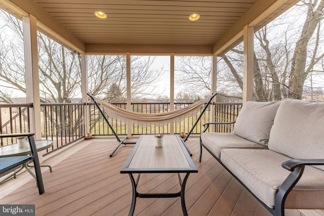 deck with an outdoor hangout area