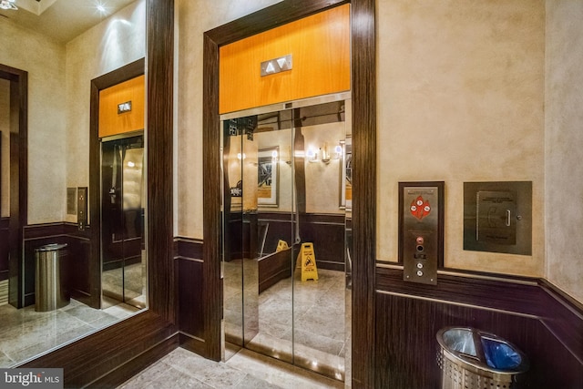 interior space featuring light tile patterned floors