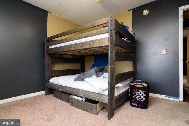 bedroom featuring carpet