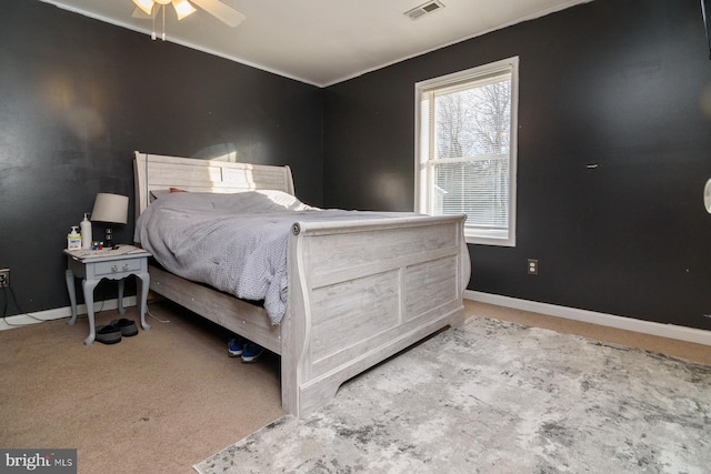 bedroom with light carpet