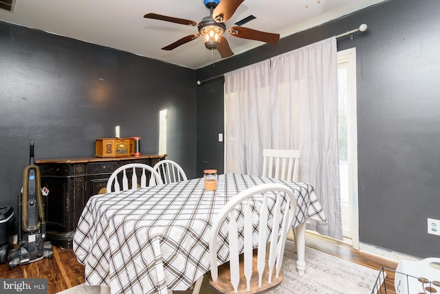 bedroom featuring hardwood / wood-style floors and ceiling fan