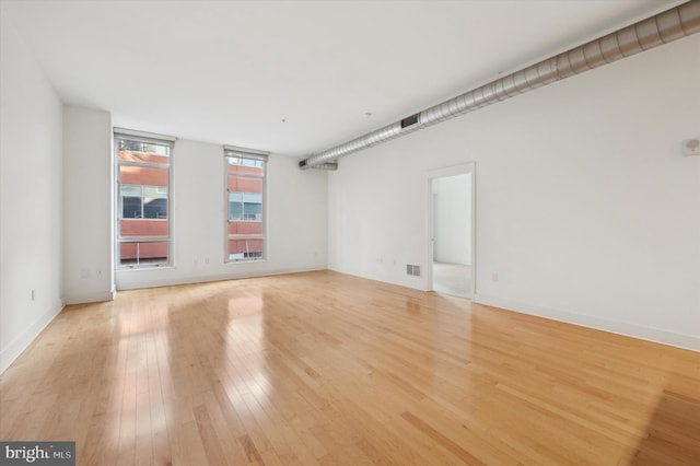 empty room featuring light hardwood / wood-style floors