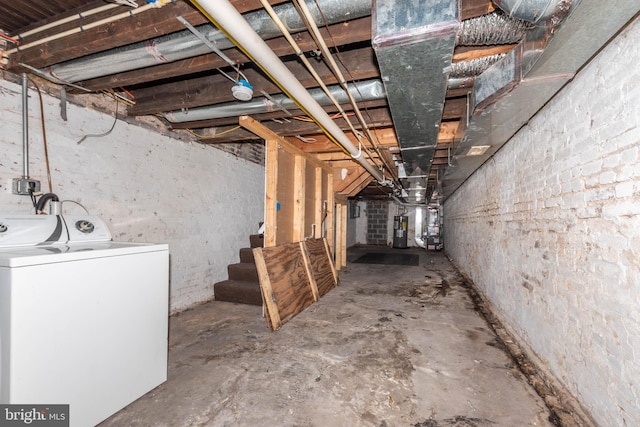 basement featuring washer / dryer and water heater