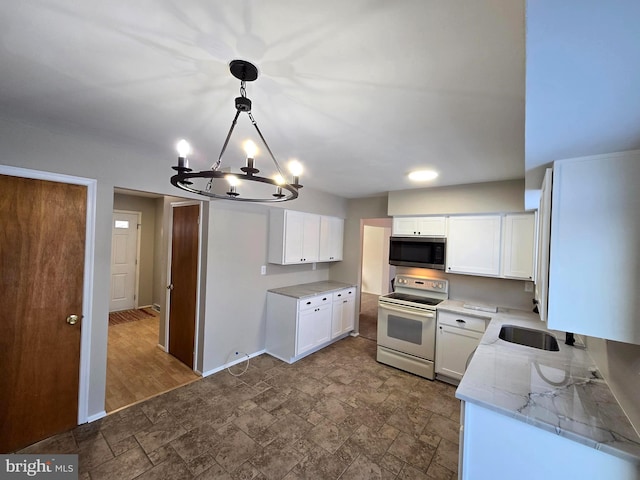 kitchen featuring sink, white cabinetry, light stone counters, hanging light fixtures, and electric range