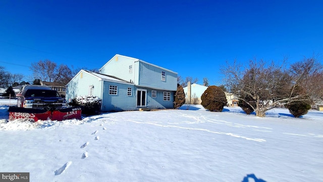 view of snow covered property