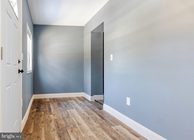 spare room featuring light hardwood / wood-style flooring