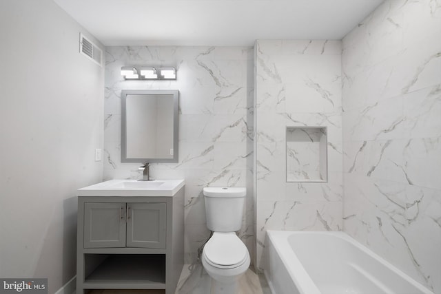 full bathroom featuring vanity, toilet, and shower / bath combination