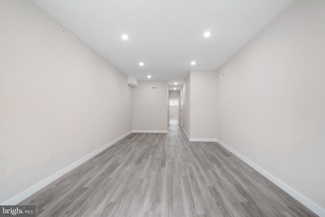 unfurnished room featuring light hardwood / wood-style flooring