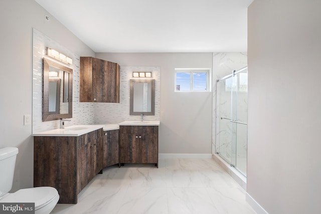 bathroom with tasteful backsplash, vanity, toilet, and walk in shower