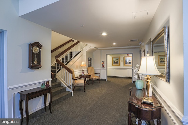 hallway with dark carpet